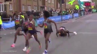 Kenya's Jemima Sumgong overcomes a heavy fall and collision with a spectator