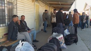 Syrian refugees wait at Turkish border, eager to return home after fall of Assad's government