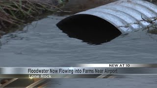 County Digs Ditch to Save Airport from Flooding