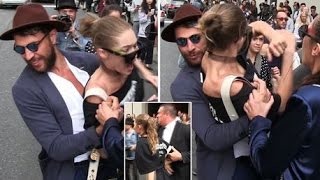 Frantic Gigi Hadid lashes out with her elbow after being picked up by overzealous fan in Milan