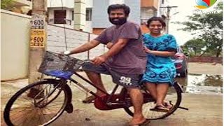 Santhosh Narayanan takes a jolly ride in the bicycle with his wife | Hot Tamil Cinema News