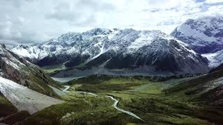 Snow capped mountain peaks #mountains #snowcappedpeaks #snow #video4k