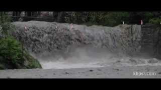 OOPS !!! ... flood water in a raging river in swiss Alps