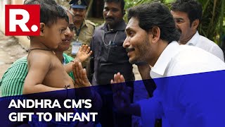 Andhra Pradesh CM YS Jagan Mohan Reddy Gifts Pen To Baby During His Visit To Flood-Hit Konaseema