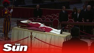 Italy's President and PM pay respects to Pope Benedict at lying-in-state