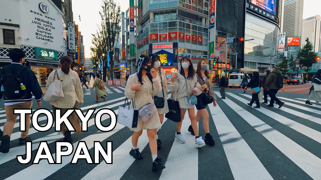 Japanese People Walking Across Street