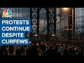 Protests over police brutality continue despite curfews in many U.S. cities