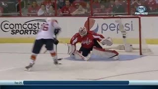 Aleksander Barkov dances around Neuvirth