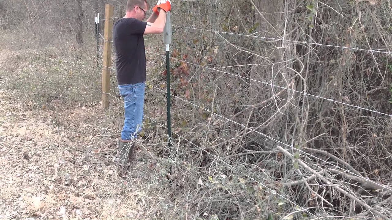 Pounding In T-Posts For Barbed Wire Fence - YouTube