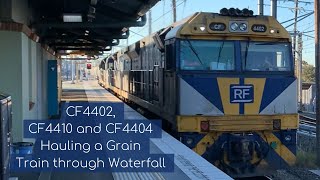 CF4402, CF4410 and CF4404 Hauling a Grain Train through Waterfall