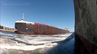 Indiana Harbor Racing the Ice in the Canal!  She actually changes the direction of the flow!