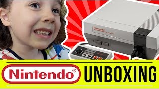 Amelia Unboxes the Original Nintendo Entertainment System | FREE DAD VIDEOS