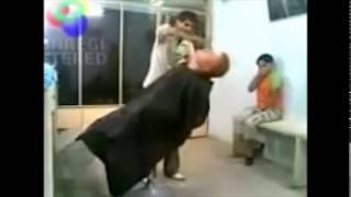 Angry Barber Slaps The Shit out of stupid man and laughing child!