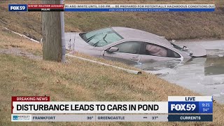 IMPD investigating after cars roll into pond on northwest side