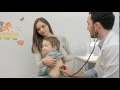 Doctor Is Examining Boy With a Stethoscope | Stock Footage - Videohive