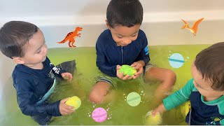 Twins Dinosaur Egg Bath Bombs! BABY DINOS Inside with Jeremy Does