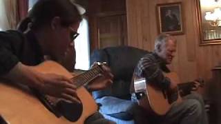 Doc Watson (86 yrs. old) and Conrad Oberg (14 yrs. old).......Sitting on Top of the World!!