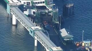 WATCH: Edmonds/Kingston ferries delayed after log truck spills its load