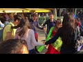 olivier chants hare krishna at saint michel and onlookers dance with devotees