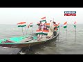 women celebrate republic day on boat with national flag in between chilika lake