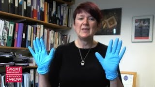Using gloves to handle museum objects