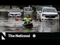 Australia flooding forces thousands to leave homes