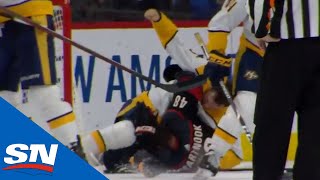 Matt Benning Unleashes Haymakers On Jordan Martinook While Both Down On Ice