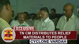 EXCLUSIVE : TN CM O. Panneerselvam distributes Relief Materials to people affected by Cyclone Vardah