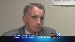 Inmate attacks officer in escape try