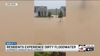 VIDEO: Residents at Summers Corner development experience dirty floodwater