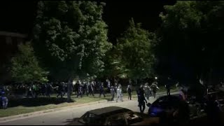 Police move up Monument Ave. Sunday night