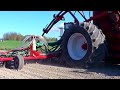 homemade bioslurry spreader and seed drill. puts the seed in the wet slurry.