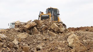 Massive New Layer Swamp Landfill Structure Bulldozer Pushing Rock Dump Truck Unloading Stone Dirt