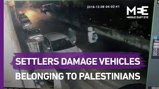 Israeli settlers damage vehicles  belonging to Palestinians