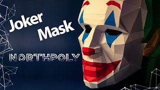 The process of assembling a Joker mask