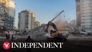 Bulldozers clear rubble in Turkish cities after deadly earthquake
