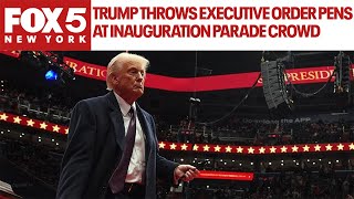 Trump throws executive order pens at inauguration parade crowd: Raw video