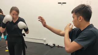 JK Wing Chun - Practicing blocking punches.