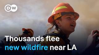 Residents told to leave as new blaze spreads north of Los Angeles, fanned by strong winds  | DW News