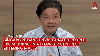 Singapore bans dining-in at hawker centres, entry to shopping malls for unvaccinated from Oct 13