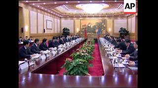 Mongolia's embattled PM meets his Chinese counterpart