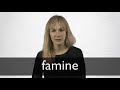 How to pronounce FAMINE in British English