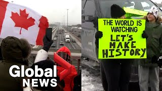Trucker convoy: People line bridges in Greater Toronto Area as trucks roll through