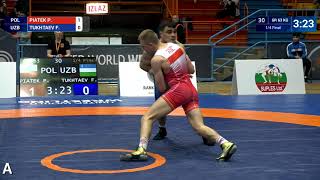 1/4 GR - 63 kg: P. PIATEK (POL) v. F. TUKHTAEV (UZB)