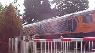 The Class 66 GBRf No.66707 with HYA Hopper Wagons was passed through at Milton Level Crossing.