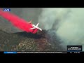 planes drop fire retardant to stop the east fire from spreading