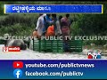 people cross overflowing kumudavathi river on a bullock cart haveri public tv