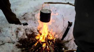 Adirondack winter snowshoeing with friends. Coffee, bacon, and feathersticks