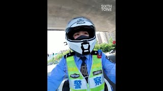 Tender Traffic Cop in Jiangsu Goes Viral