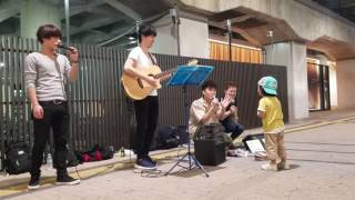 My 3-year-old son listening in on a street live performance. Doraemon's Song Surprise Motohiro Hata